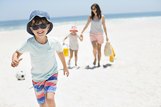 little-boy-running-on-sand